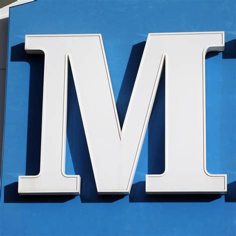 M.
